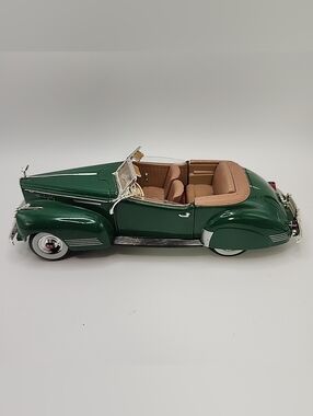 Dark Green Vintage Convertible Model Car with Tan Interior